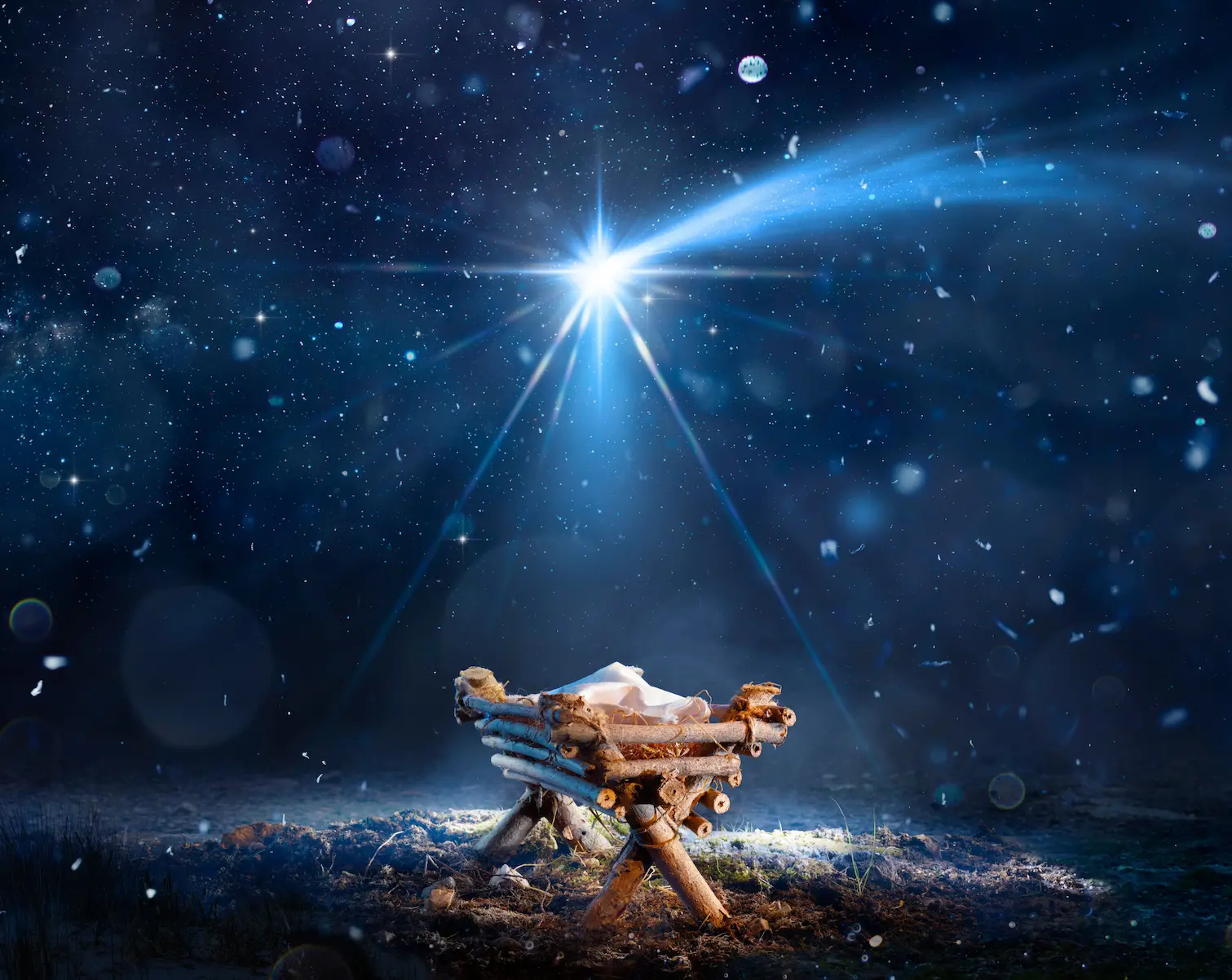 Kribbe met baby Jezus onder een stralende ster